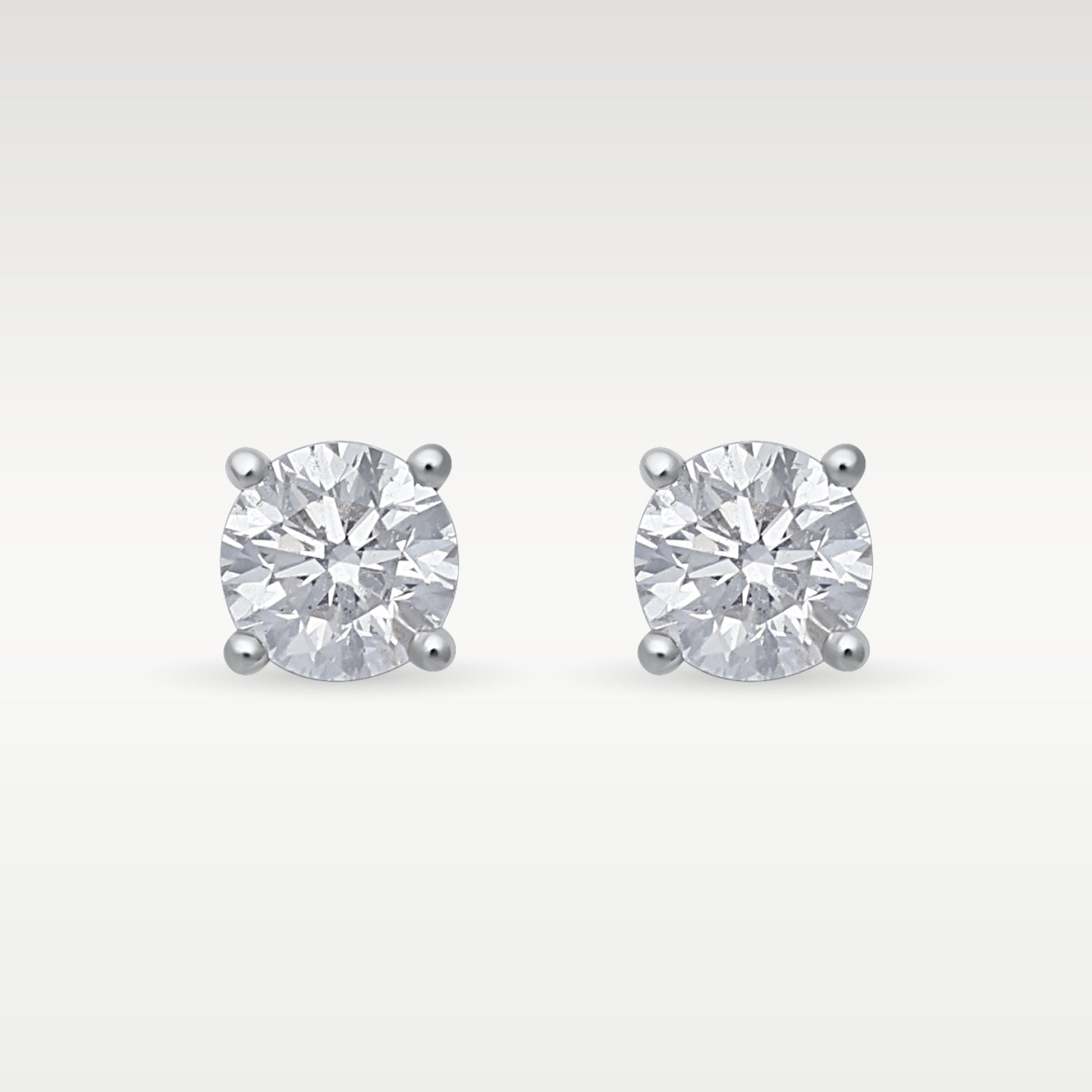 White Gold 0.75 carat Round Diamond Studs | Noah's Fine Jewelry and Watches Frisco, Texas