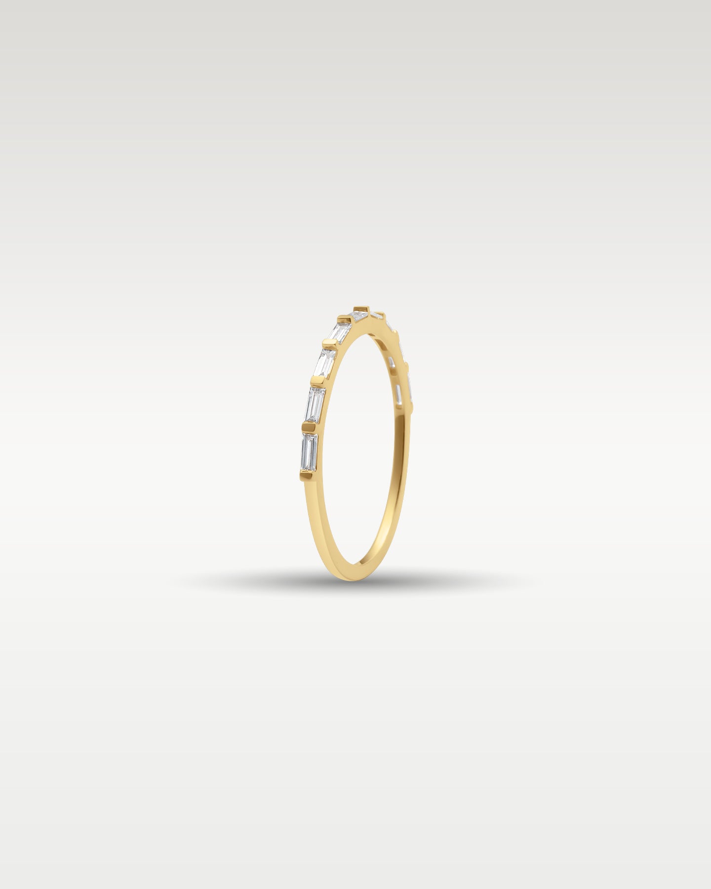 14k Yellow Gold Nine Stone Baguette Diamond Band | Noah's Fine Jewelry Frisco, Texas