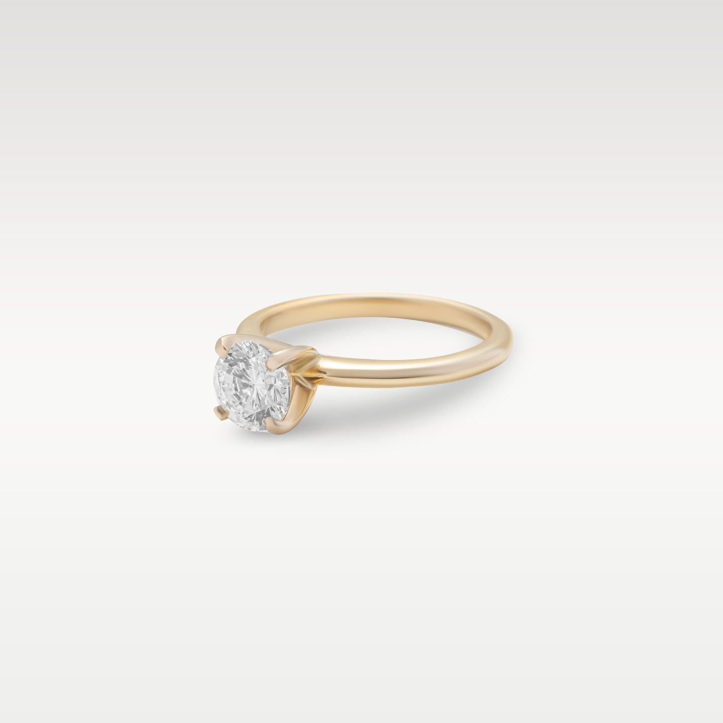 Yellow Gold Round Solitaire Diamond Engagement Ring | Noah's Fine Jewelry and Watches