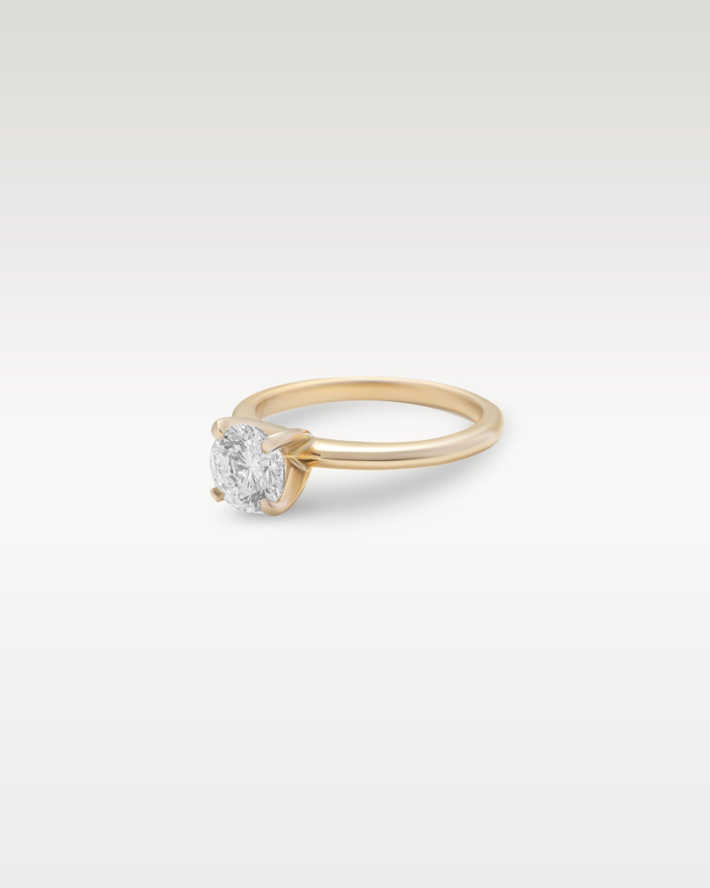 Yellow Gold Round Solitaire Diamond Engagement Ring | Noah's Fine Jewelry and Watches