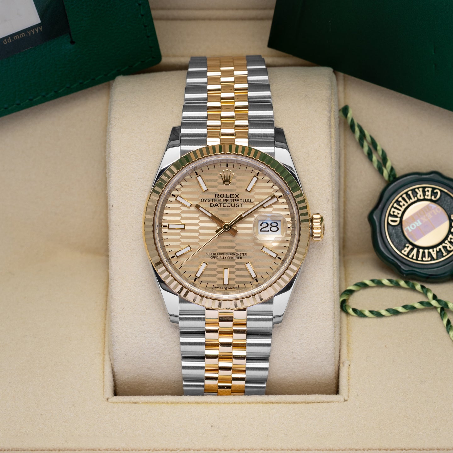 Rolex Datejust Champagne Motif 126233 | Noah's Fine Watches and Jewelry