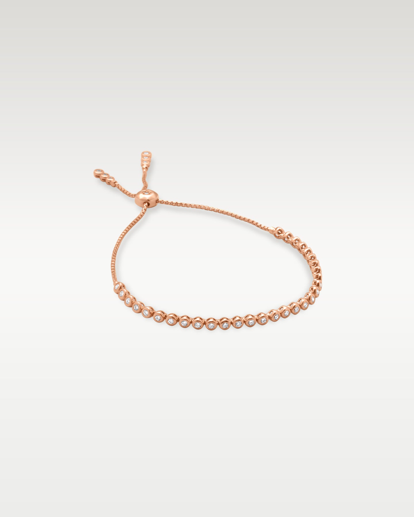 Rose Gold Bezel-Set Diamond Bolo Bracelet | Noah's Fine Jewelry and Watches Dallas