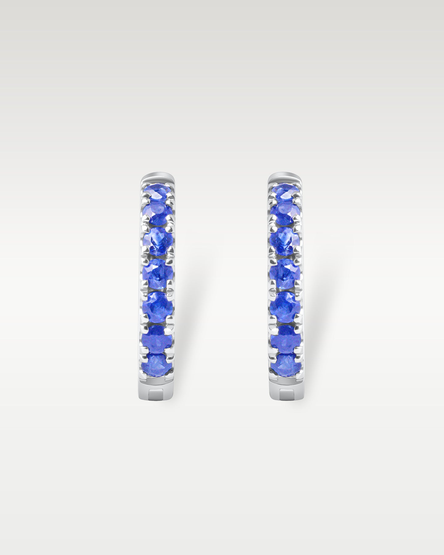 White Gold Sapphire Huggie Hoop Earrings | Noah's Fine Jewelry Dallas