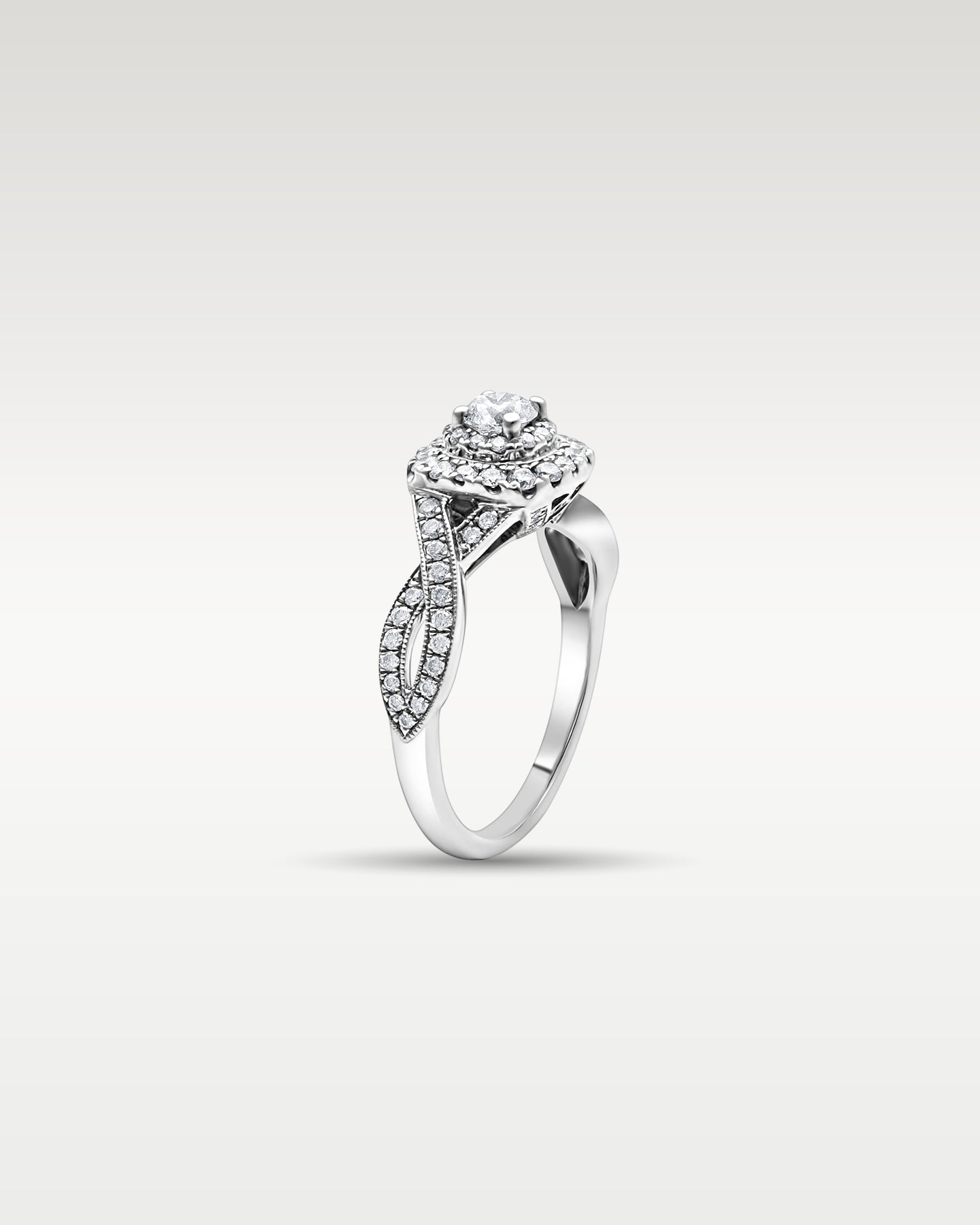 White Gold Twisted Round Diamond Engagement Ring | Noah’s Fine Jewelry Dallas
