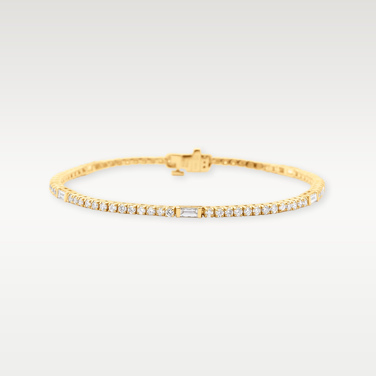 Yellow Gold Round & Baguette Tennis Bracelet | Noah's Fine Jewelry DFW, Texas