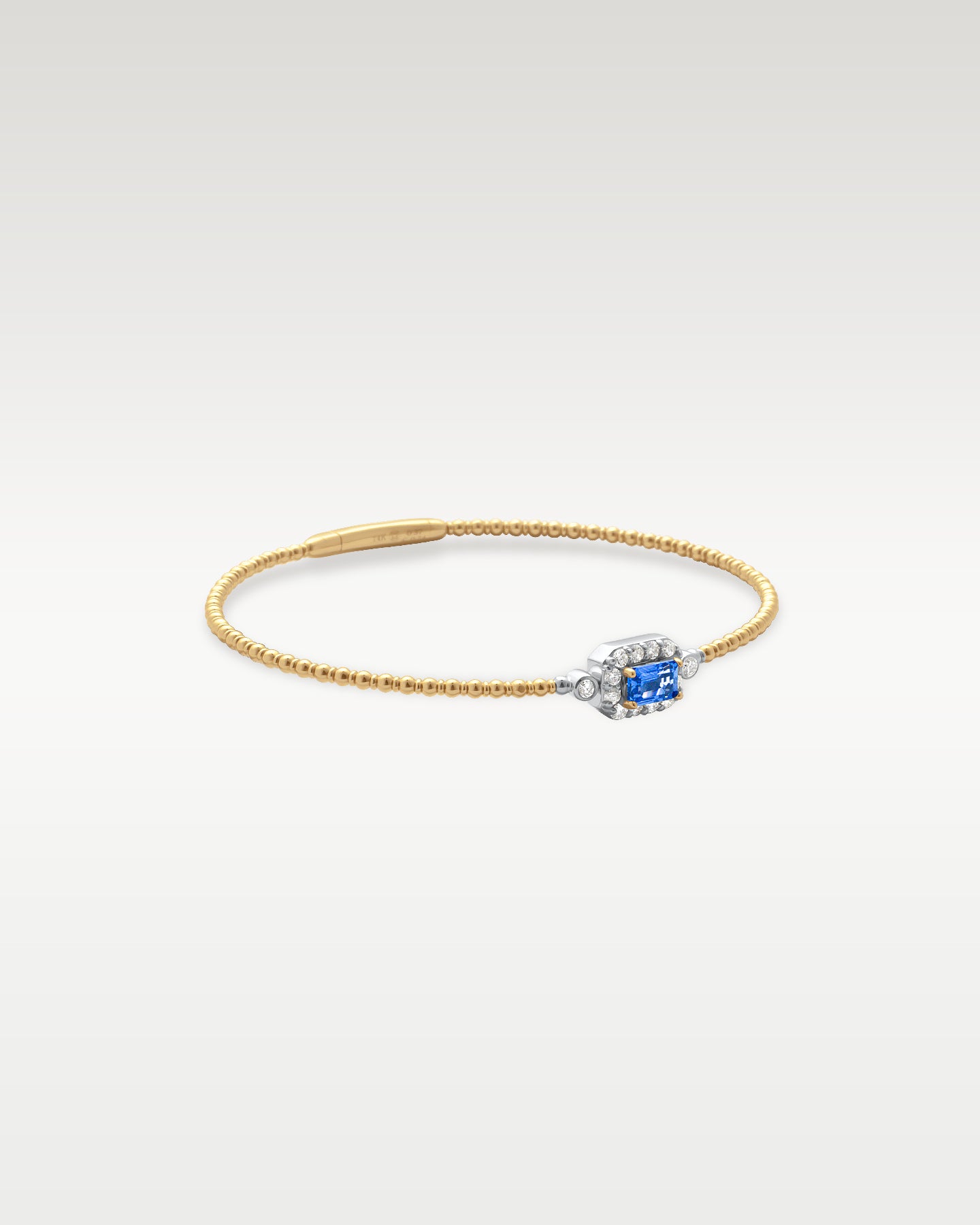 Gold Sapphire Diamond Flex Bangle Bracelet | Noah's Fine Jewelry and Watches Dallas