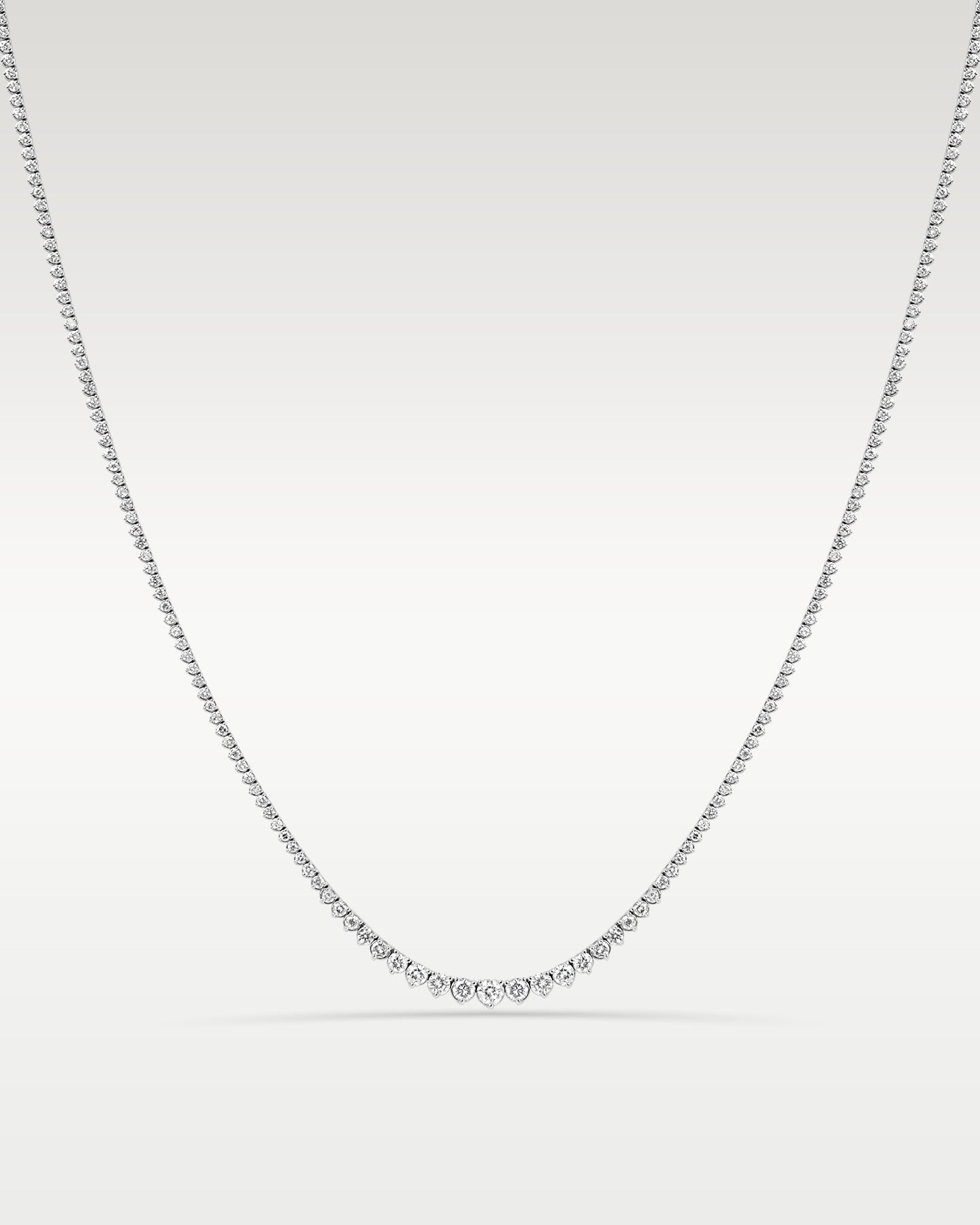 White Gold 6.85CT Riviera Tennis Necklace at Noah's Fine Watches & Jewelry