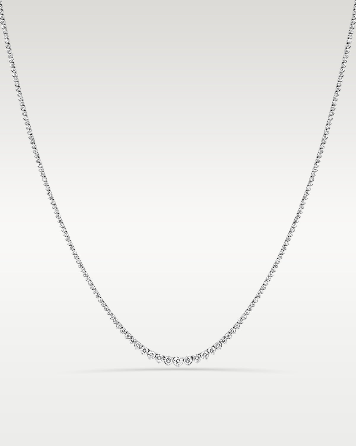 White Gold 6.85CT Riviera Tennis Necklace at Noah's Fine Watches & Jewelry