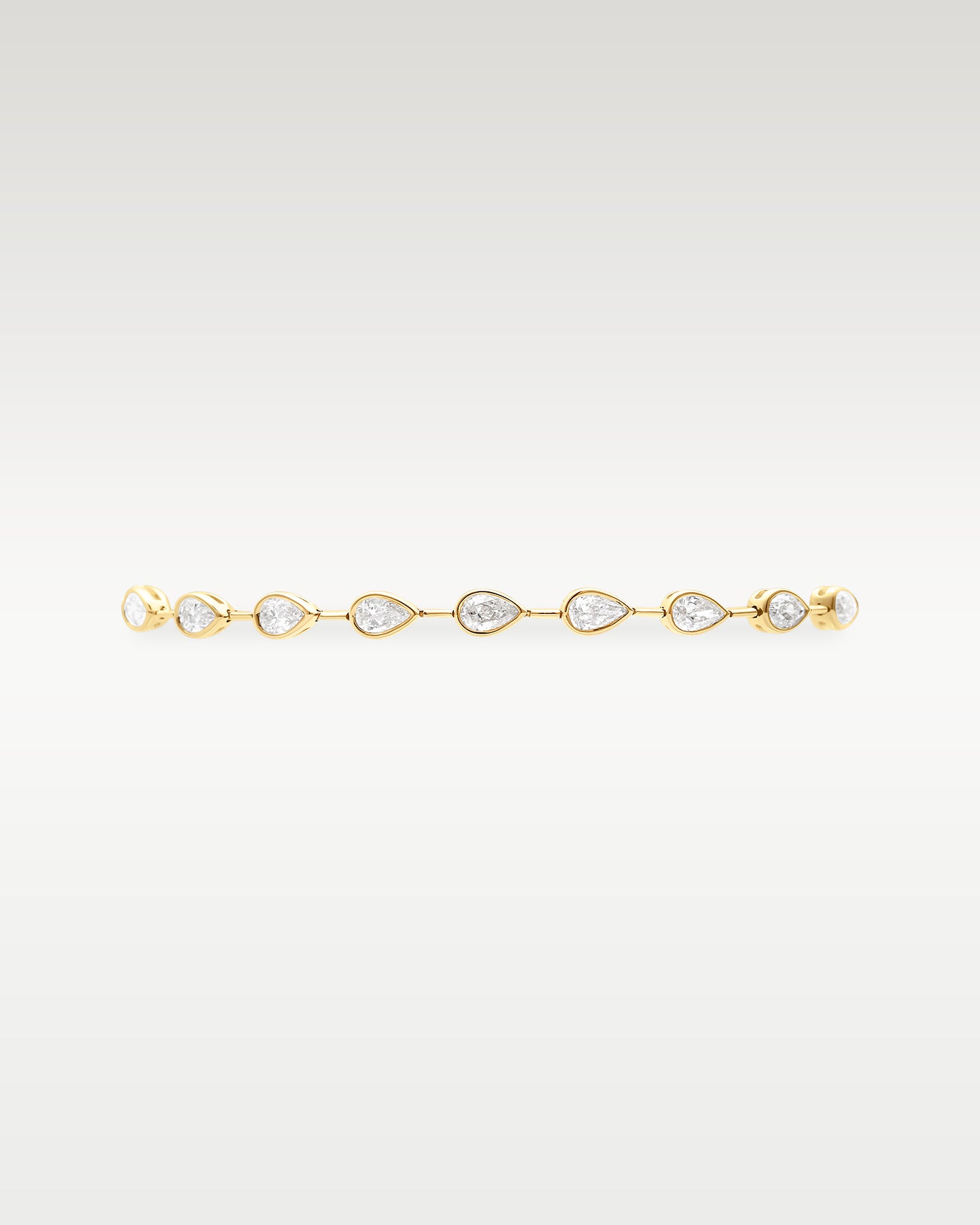 Yellow Gold Bezel Pear Diamond Bracelet | Noah's Fine Gold Jewelry for Women DFW