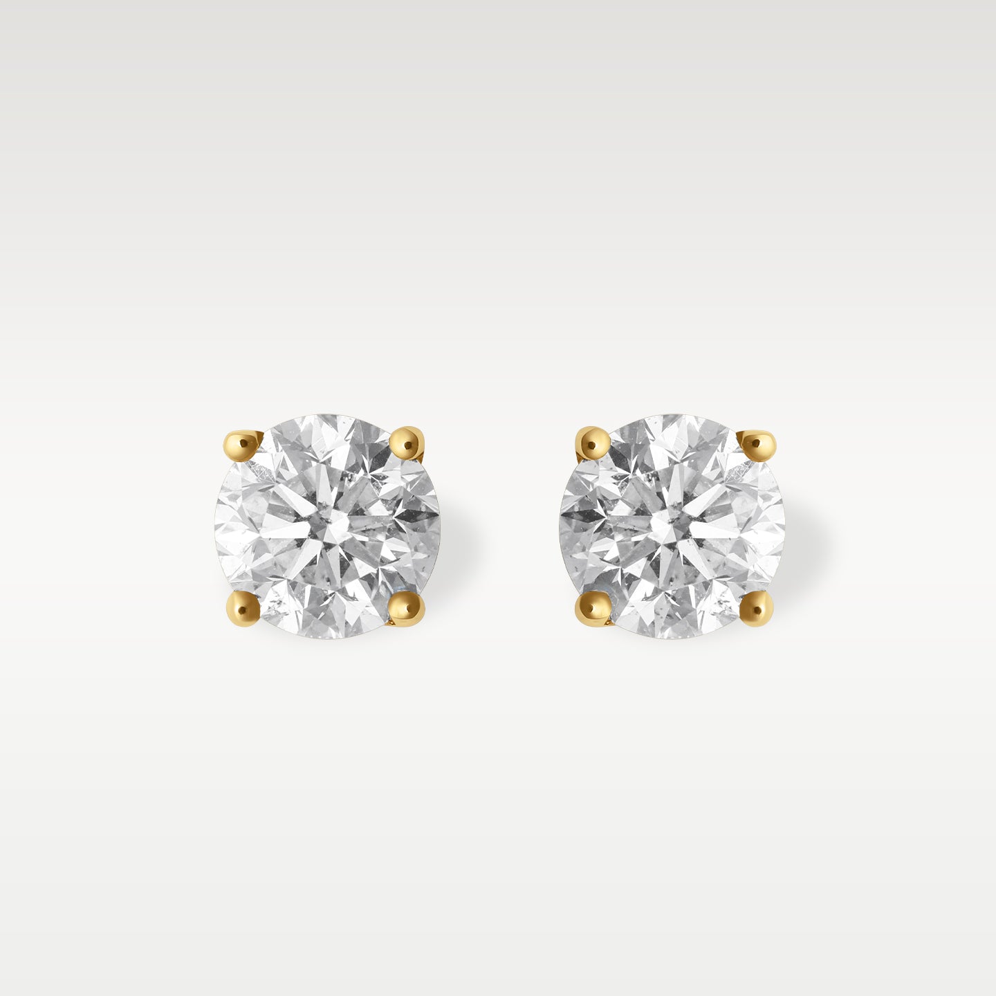 14K Yellow Gold 1.50CT Round Diamond Studs | Noahs fine jewelry texas