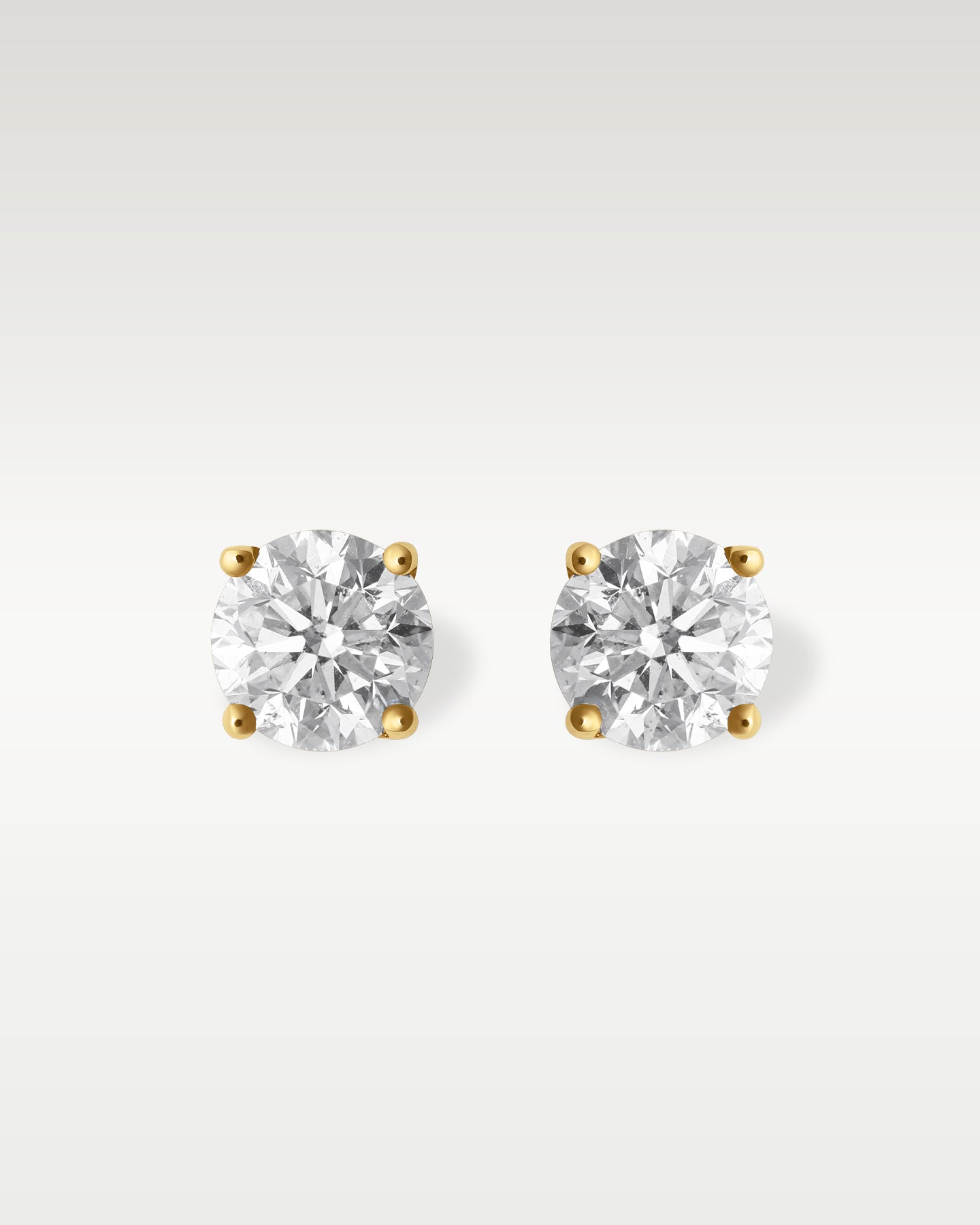14K Yellow Gold 1.50CT Round Diamond Studs | Noahs fine jewelry texas