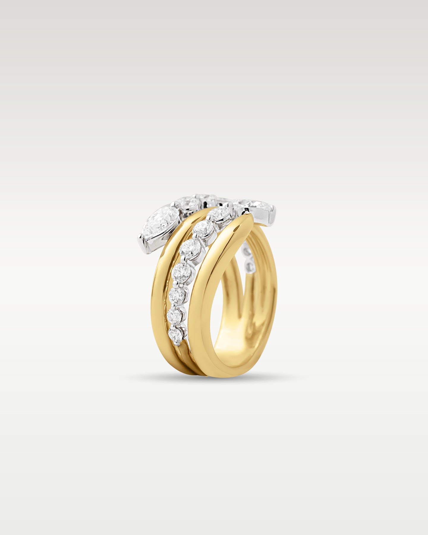 Side profile view highlighting the layered 14k yellow gold bands and high-set diamond arrangement of the wrap ring