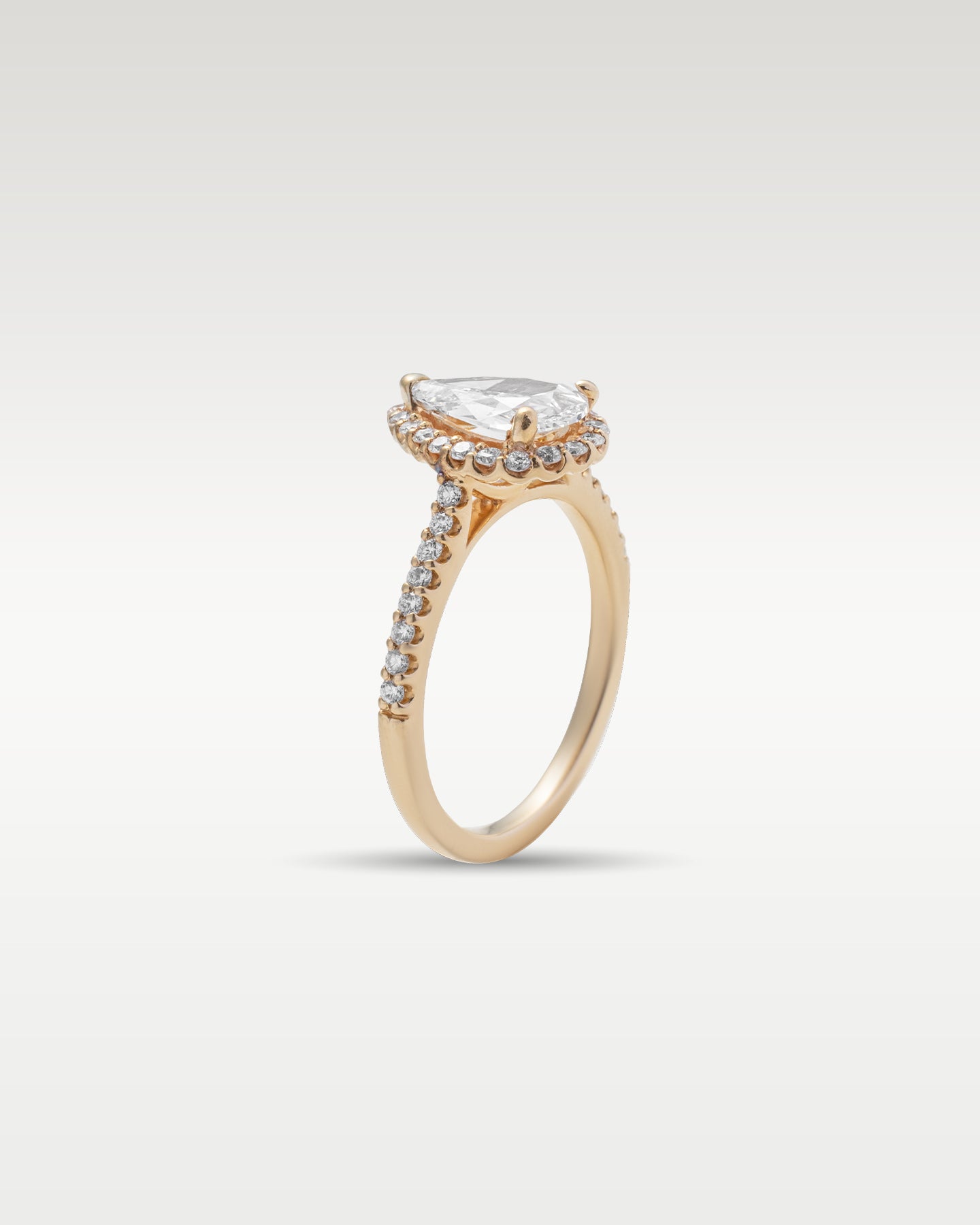 Rose Gold Pear Shaped Diamond Engagement Ring | Noah's Fine Watches and Jewelry