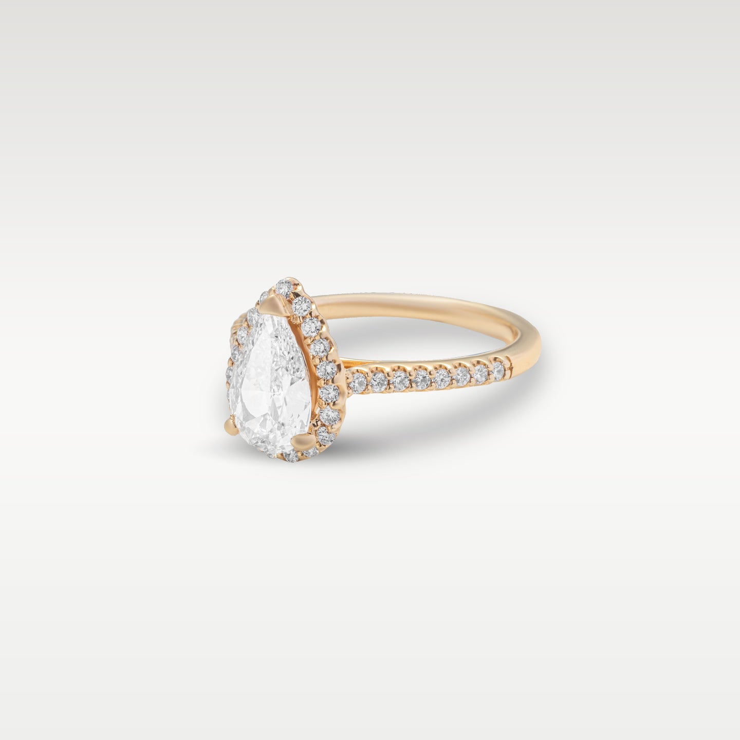 Rose Gold Pear Shaped Diamond Engagement Ring | Noah's Fine Watches and Jewelry