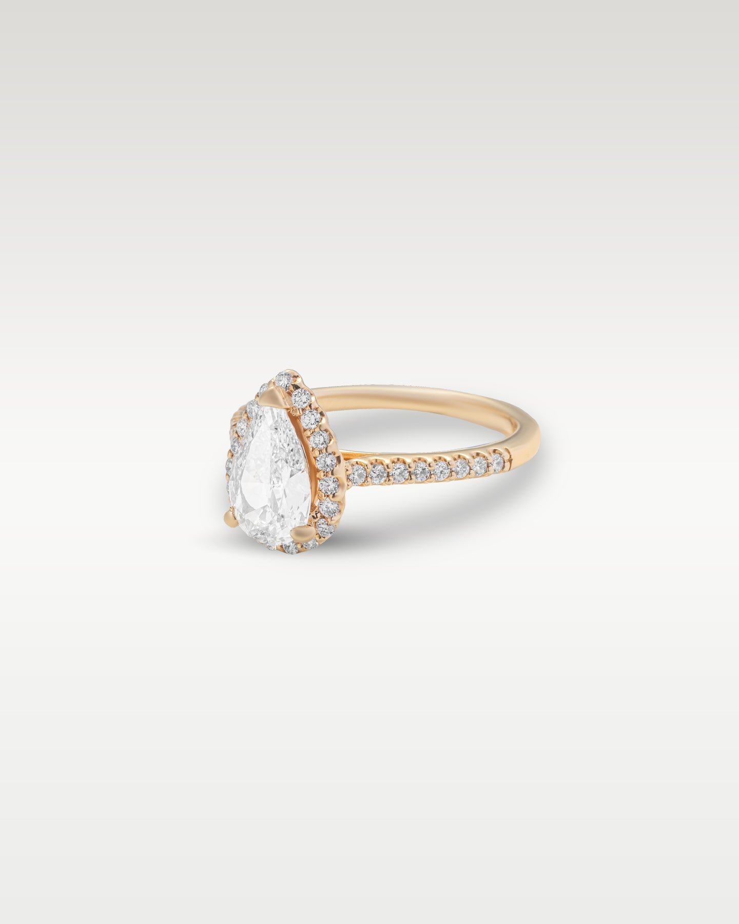 Rose Gold Pear Shaped Diamond Engagement Ring | Noah's Fine Watches and Jewelry