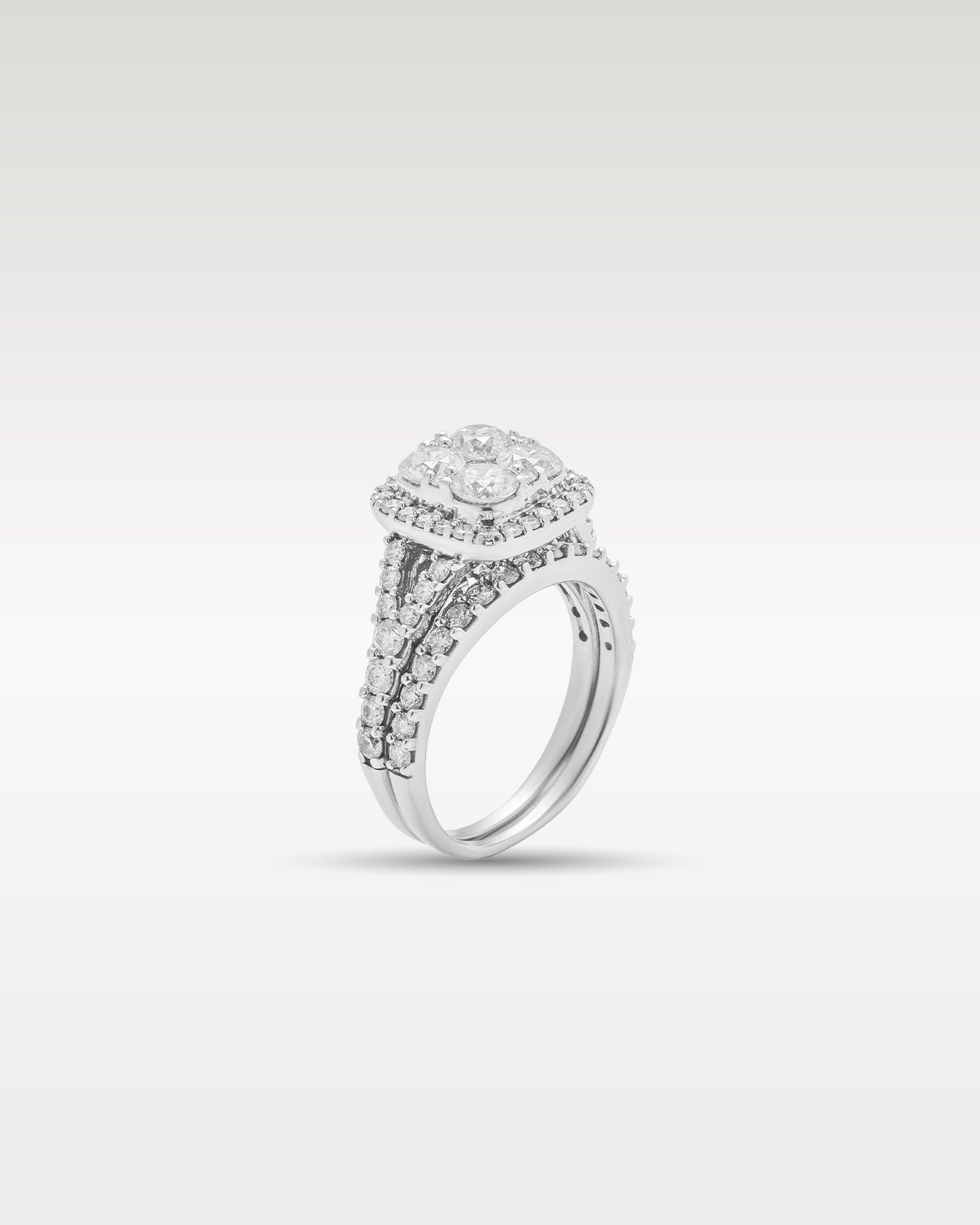 White Gold Round Diamond Cluster Engagement Ring | Noah's Fine Jewelry and Watches