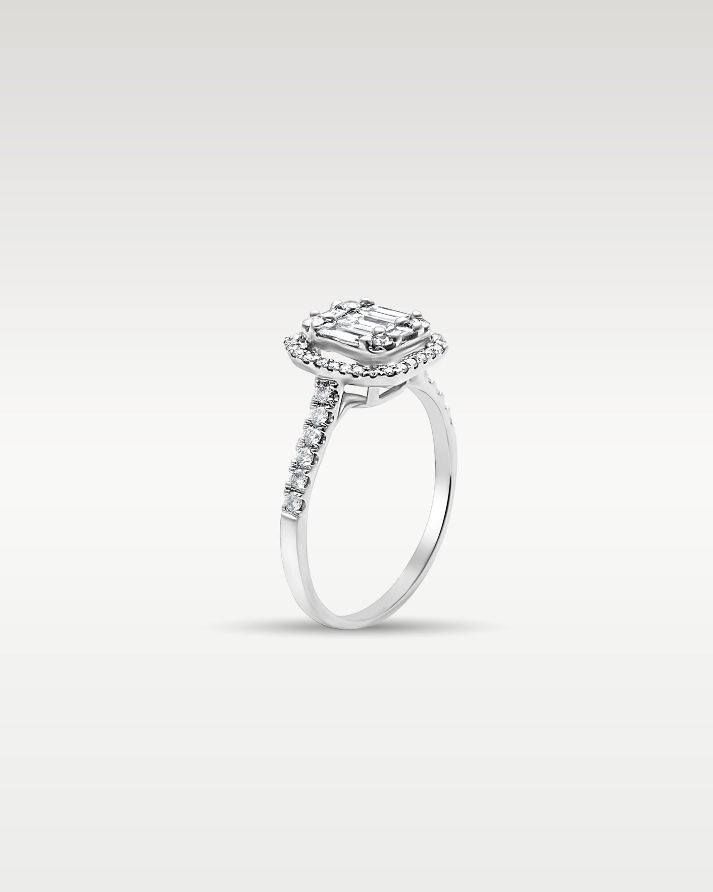 White Gold Emerald Cut Diamond Halo Engagement Ring | Noah's Fine Jewelry DFW, Texas