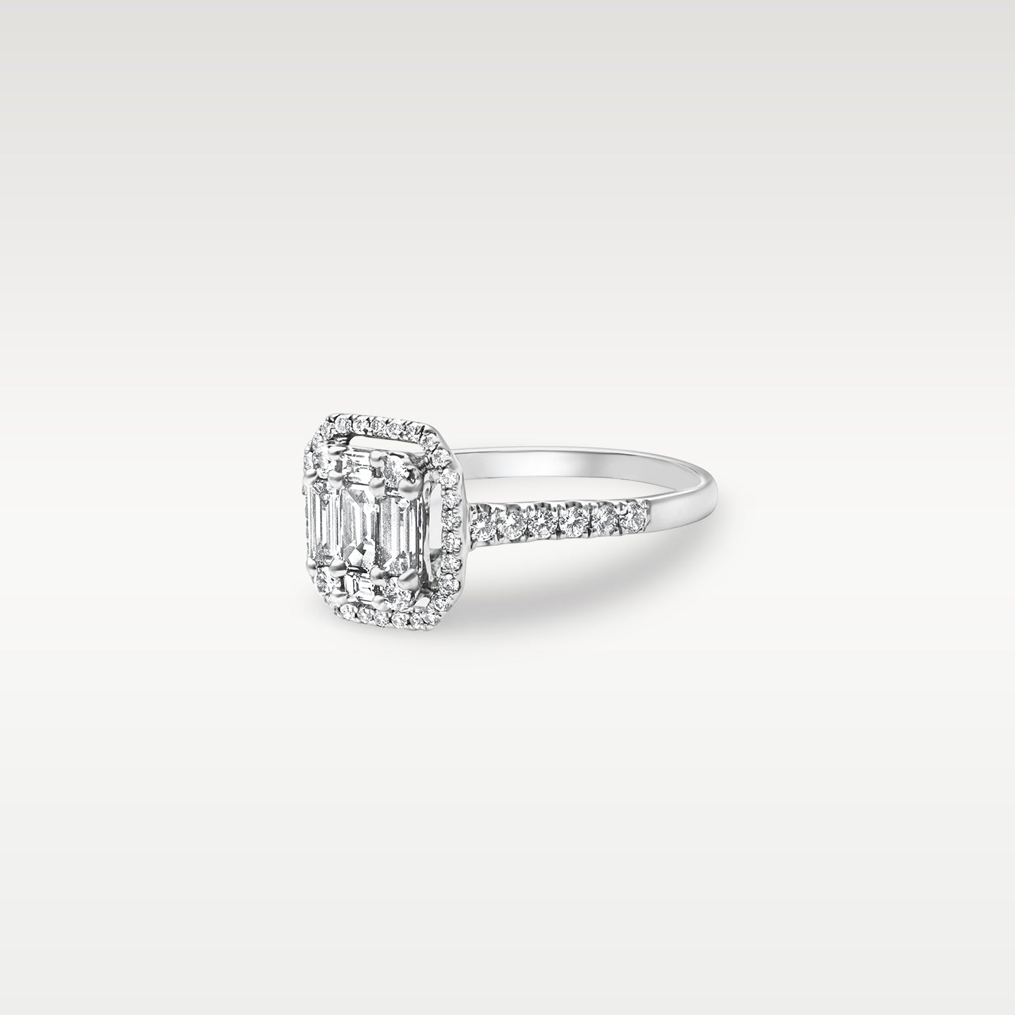 White Gold Emerald Cut Diamond Halo Engagement Ring | Noah's Fine Jewelry DFW, Texas