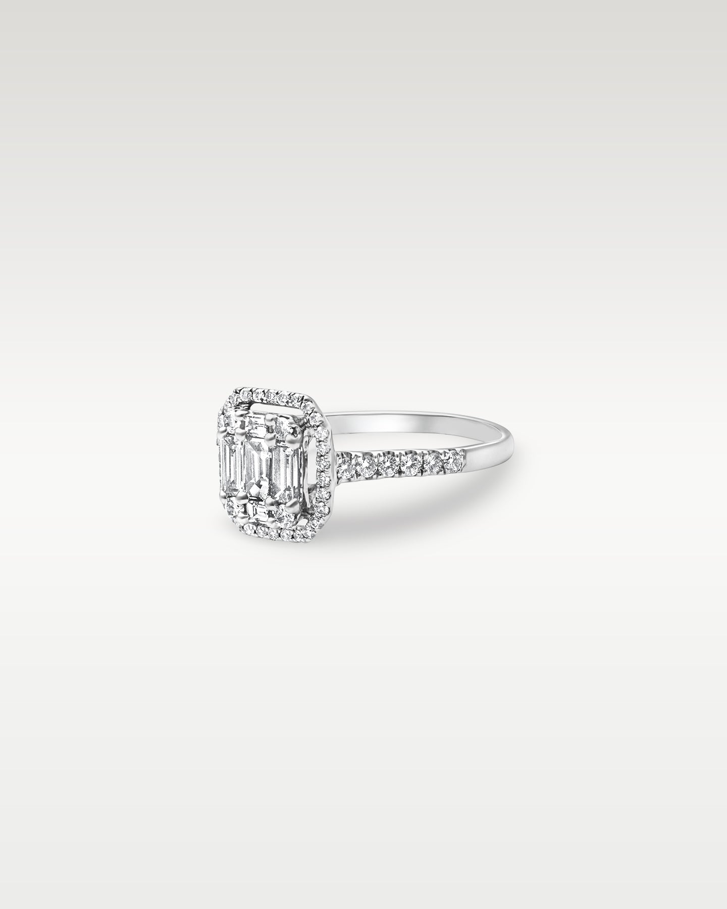 White Gold Emerald Cut Diamond Halo Engagement Ring | Noah's Fine Jewelry DFW, Texas
