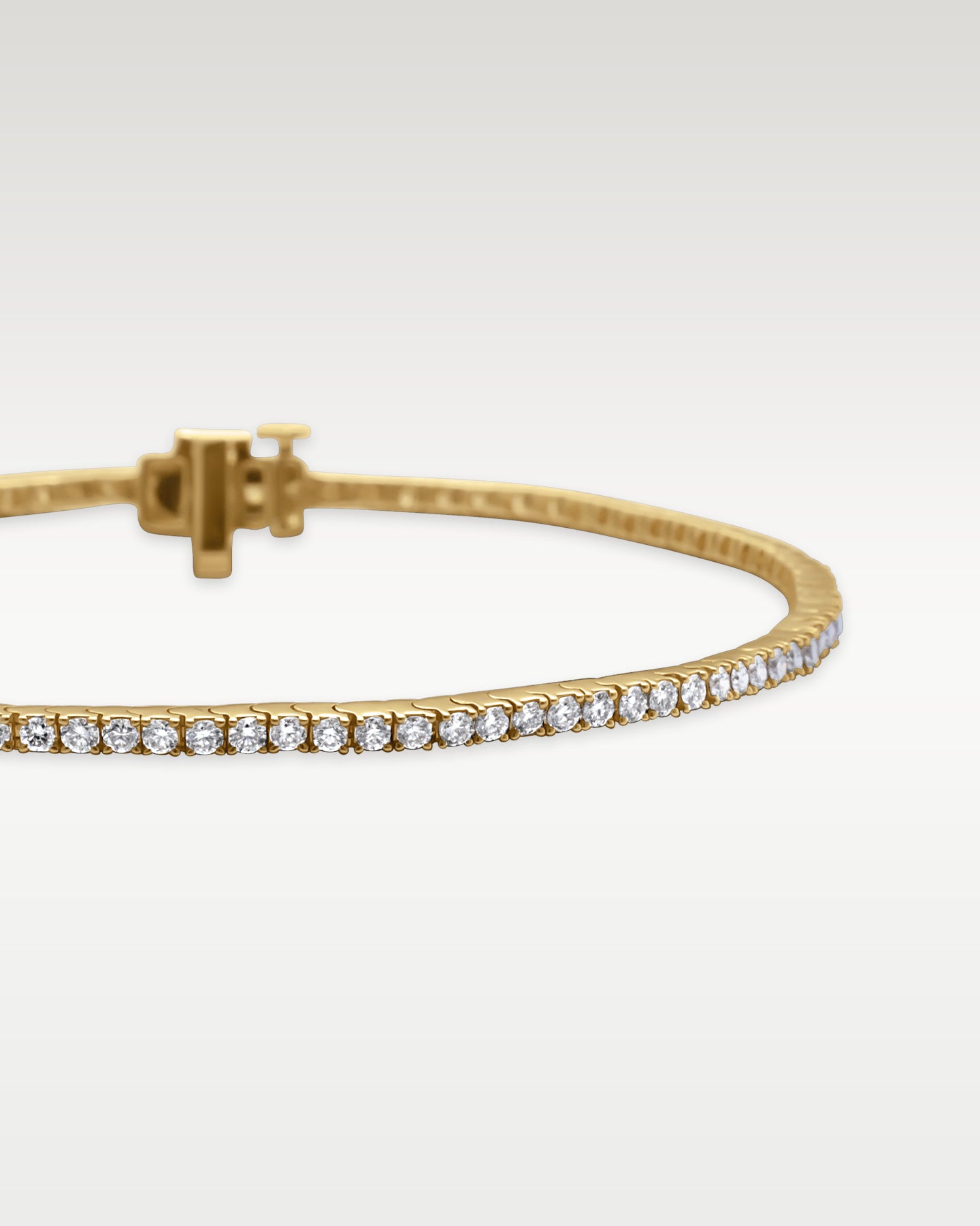 14k Yellow Gold Round Tennis Bracelet | Noah's Fine Jewelry Frisco, Texas