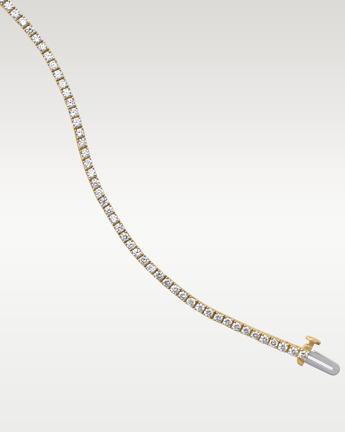 14k Yellow Gold Round Tennis Bracelet | Noah's Fine Jewelry Frisco, Texas