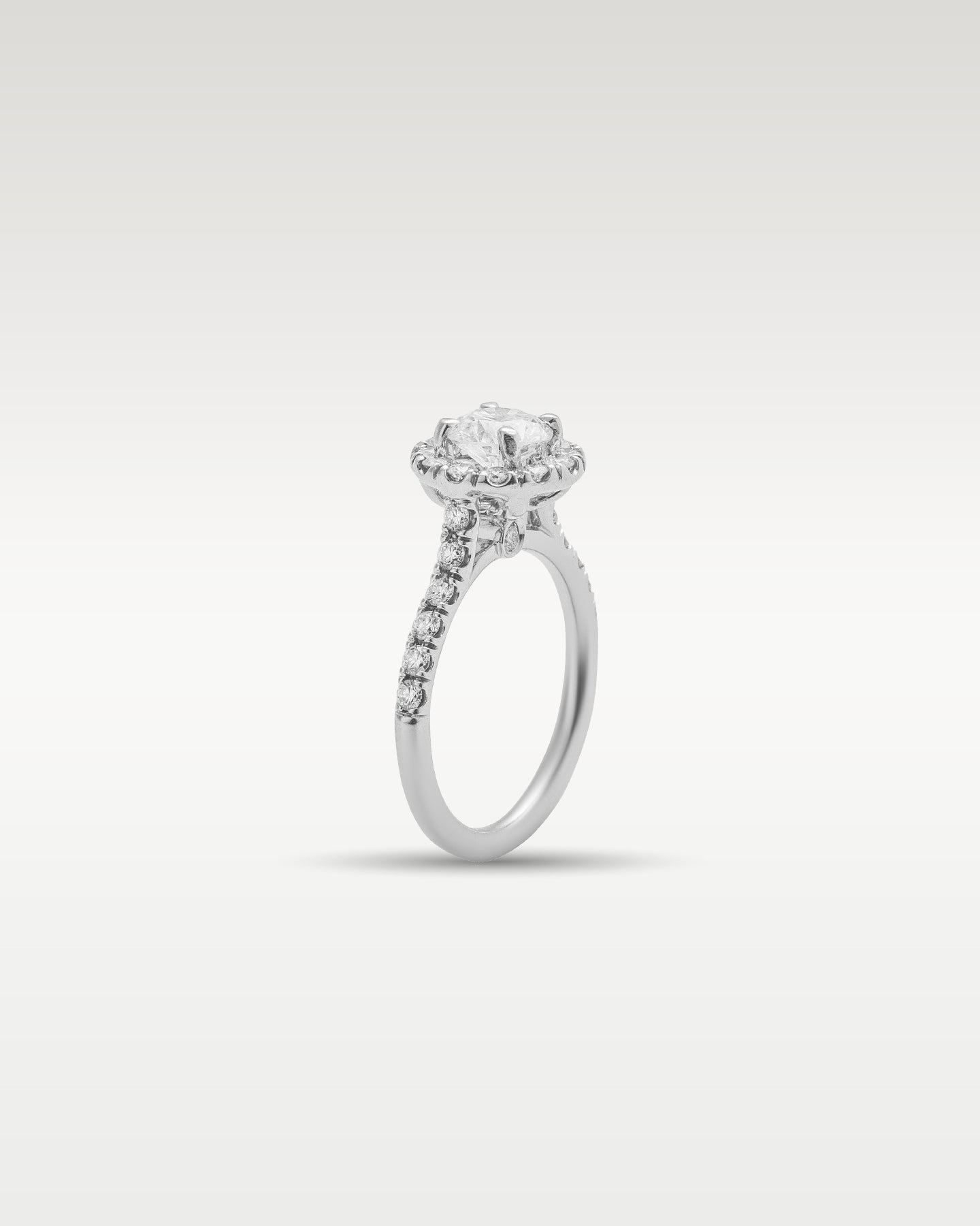 White Gold Halo Round Diamond Engagement Ring | Noah's Fine Jewelry and Watches