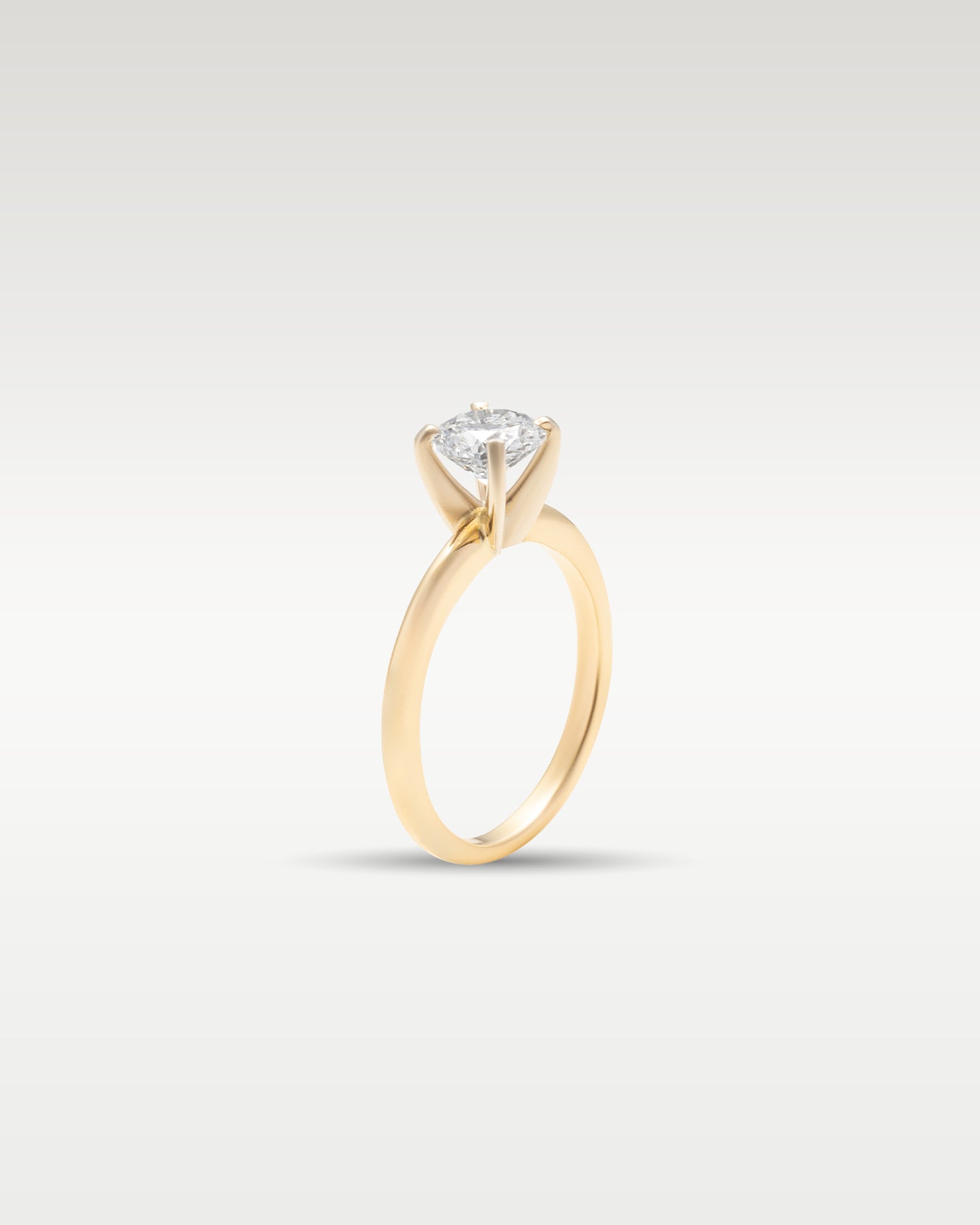 Yellow Gold Round Solitaire Diamond Engagement Ring | Noah's Fine Jewelry and Watches