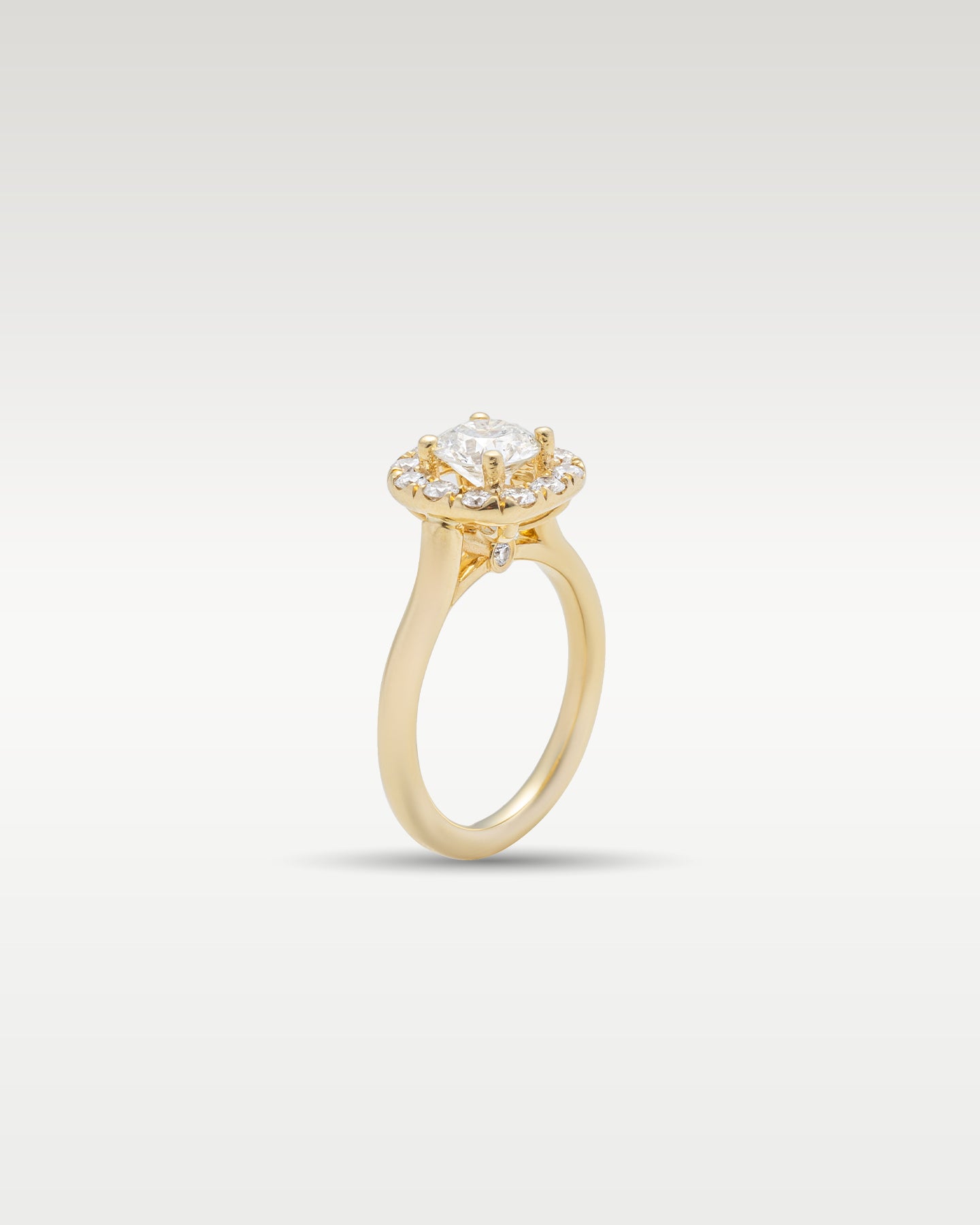 Yellow Gold Cushion Halo Round Diamond Engagement Ring | Noah's Fine Jewelry and Watches
