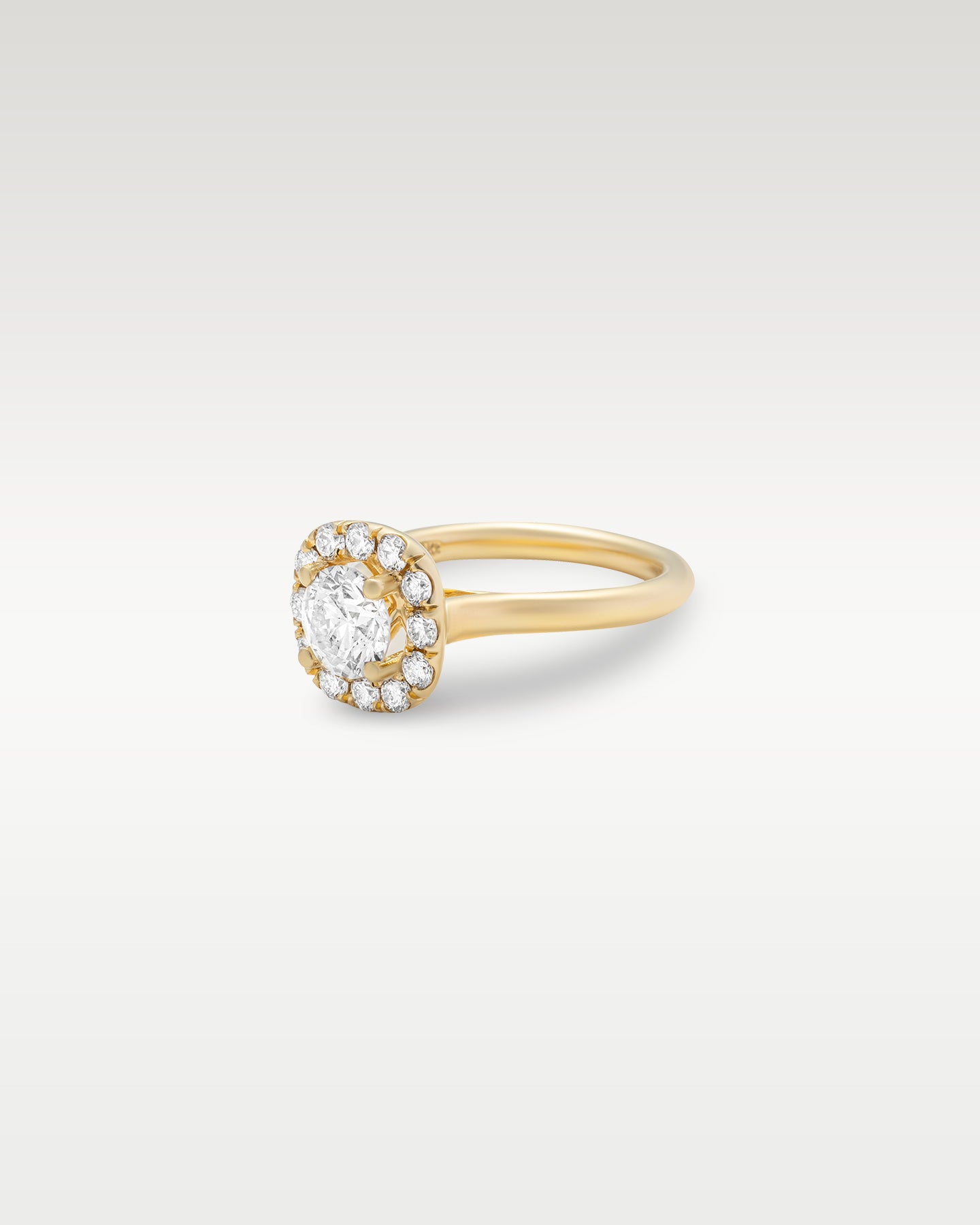Yellow Gold Cushion Halo Round Diamond Engagement Ring | Noah's Fine Jewelry and Watches