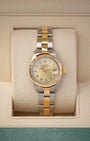 1981 Rolex Lady-Datejust Reference 6916 two-tone yellow gold and stainless steel watch with champagne champagne dial at Noah's Fine Watches & Jewelry in Dallas, TX.