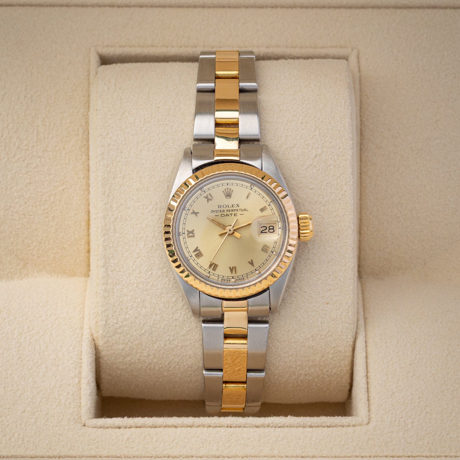 1981 Rolex Lady-Datejust Reference 6916 two-tone yellow gold and stainless steel watch with champagne champagne dial at Noah's Fine Watches & Jewelry in Dallas, TX.
