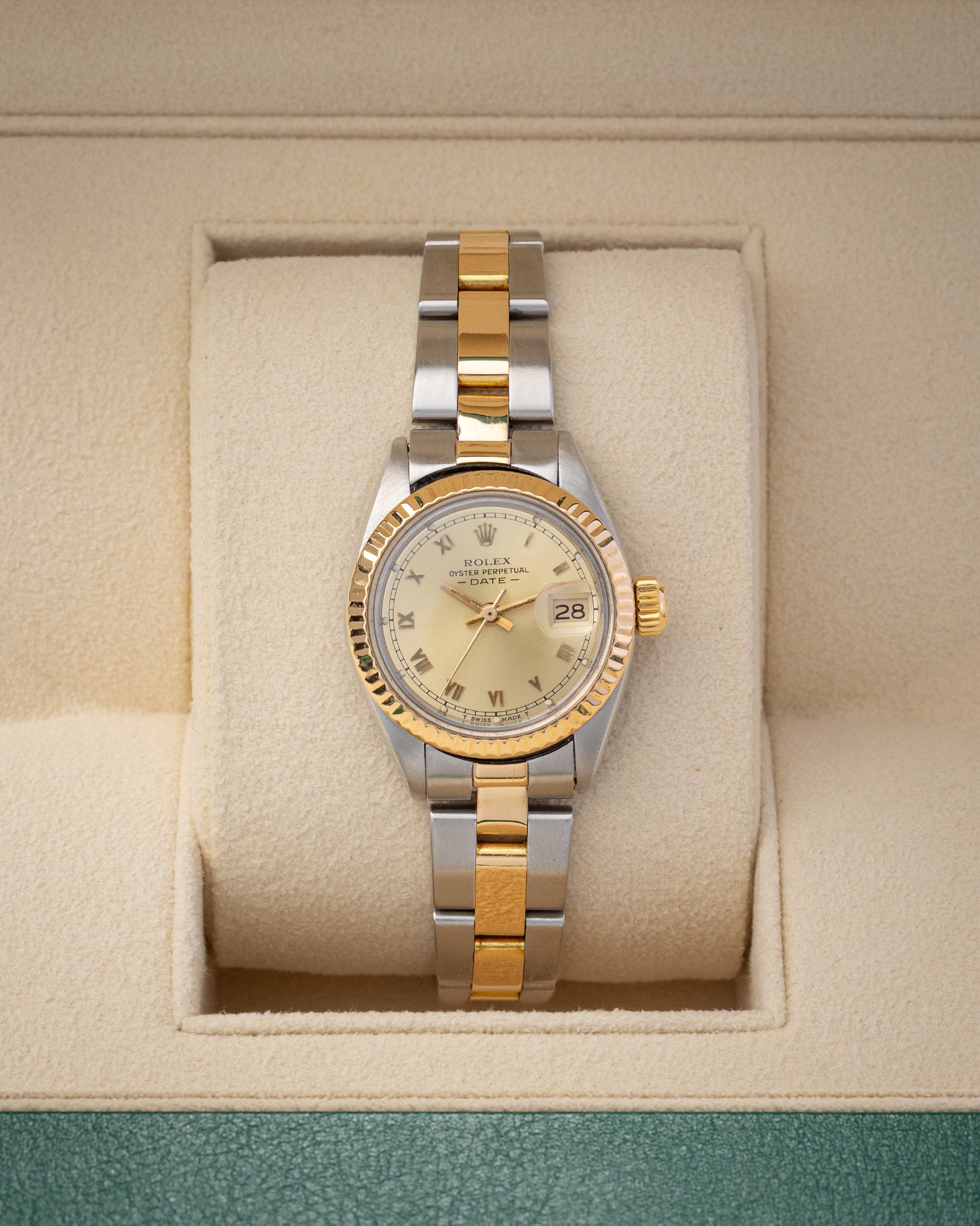 1981 Rolex Lady-Datejust Reference 6916 two-tone yellow gold and stainless steel watch with champagne champagne dial at Noah's Fine Watches & Jewelry in Dallas, TX.