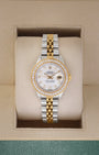 1989 two tone Rolex Lady-Datejust 69173 featuring an aftermarket white mother of pearl diamond dial and custom diamond bezel inside a watch box