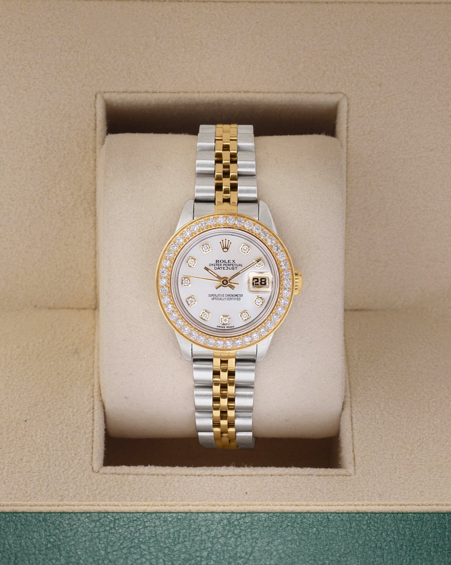 1989 two tone Rolex Lady-Datejust 69173 featuring an aftermarket white mother of pearl diamond dial and custom diamond bezel inside a watch box