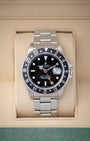 Pre owned vintage 1993 Rolex GMT-Master 40mm reference 16700 with black dial, red GMT hand, black aluminum bezel, and stainless steel Oyster bracelet at Noahs Fine Watches and Jewelry in Dallas TX