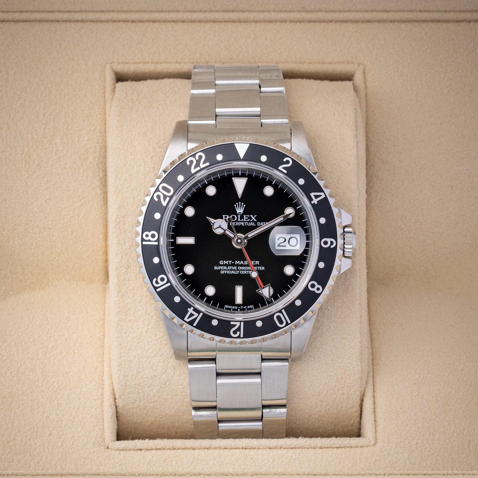 Pre owned vintage 1993 Rolex GMT-Master 40mm reference 16700 with black dial, red GMT hand, black aluminum bezel, and stainless steel Oyster bracelet at Noahs Fine Watches and Jewelry in Dallas TX