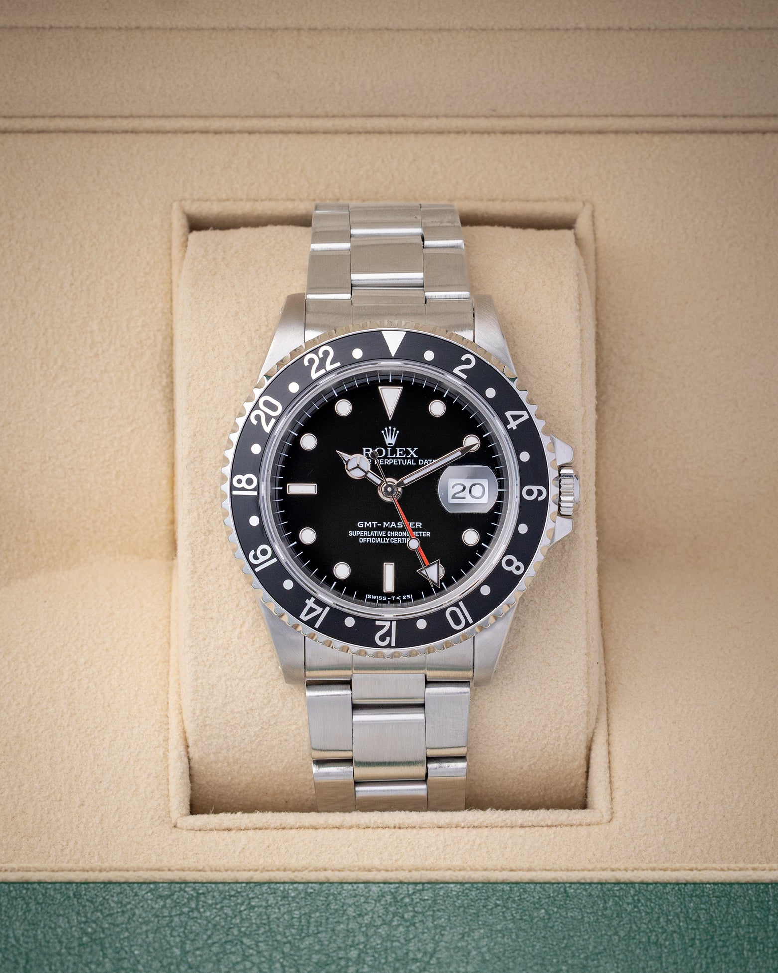 Pre owned vintage 1993 Rolex GMT-Master 40mm reference 16700 with black dial, red GMT hand, black aluminum bezel, and stainless steel Oyster bracelet at Noahs Fine Watches and Jewelry in Dallas TX