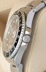 Side profile detail showing the 40mm stainless steel case with lug holes, crown guards, and signed Twinlock winding crown on a 1993 Rolex GMT-Master 16700