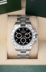 Preowned 2007 Rolex Cosmograph Daytona 116520 stainless steel watch with black dial and steel tachymeter bezel at Noah's Fine Watches and Jewelry Dallas Texas