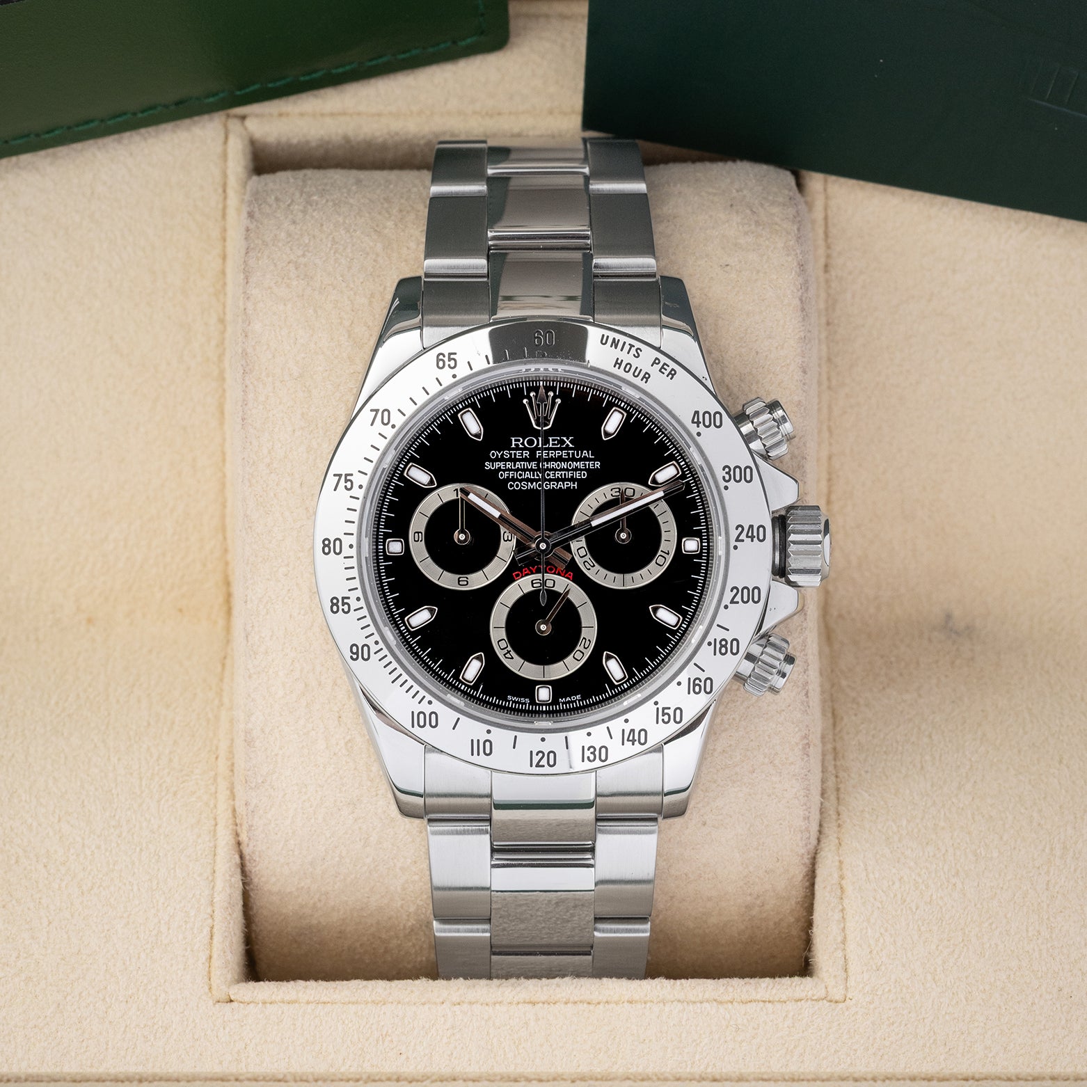 Preowned 2007 Rolex Cosmograph Daytona 116520 stainless steel watch with black dial and steel tachymeter bezel at Noah's Fine Watches and Jewelry Dallas Texas