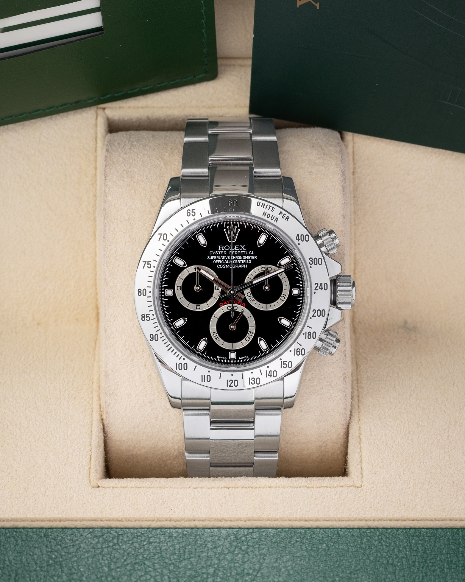 Preowned 2007 Rolex Cosmograph Daytona 116520 stainless steel watch with black dial and steel tachymeter bezel at Noah's Fine Watches and Jewelry Dallas Texas