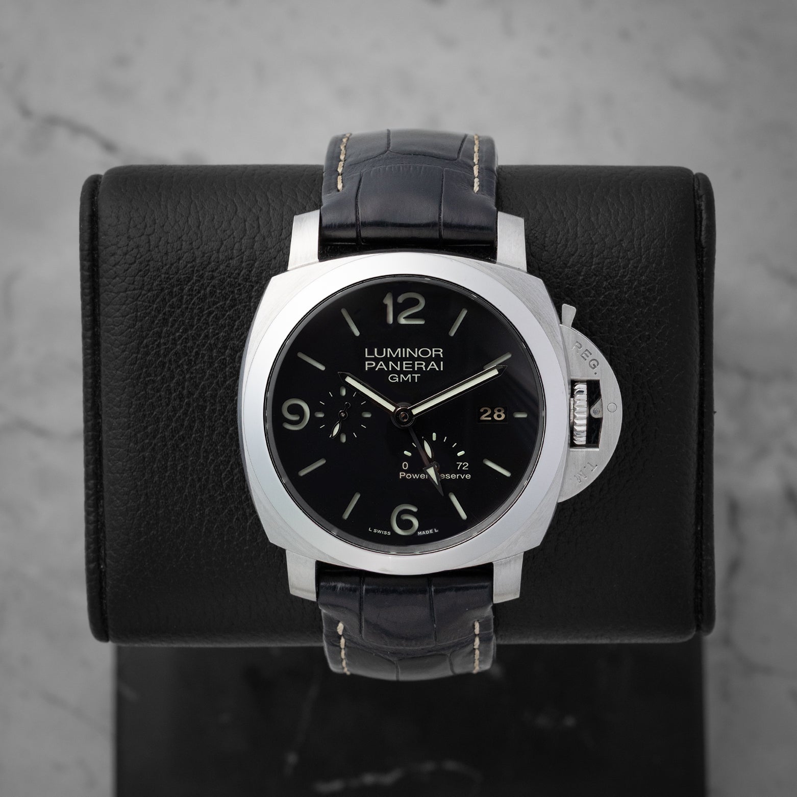 Preowned 2011 Panerai Luminor 1950 3 Days GMT Power Reserve 44mm reference PAM00321 with black dial and alligator leather strap at Noahs Fine Watches and Jewelry in Dallas TX