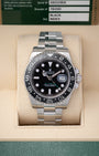 Preowned 2013 Rolex GMT-Master II 40mm reference 116710LN with black dial, green GMT hand, black Cerachrom bezel, and stainless steel Oyster bracelet at Noahs Fine Watches and Jewelry in Dallas TX