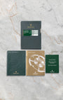 Complete documentation including official Rolex international guarantee card, green leather holder, GMT-Master II user manual, and factory booklets for reference 116710LN