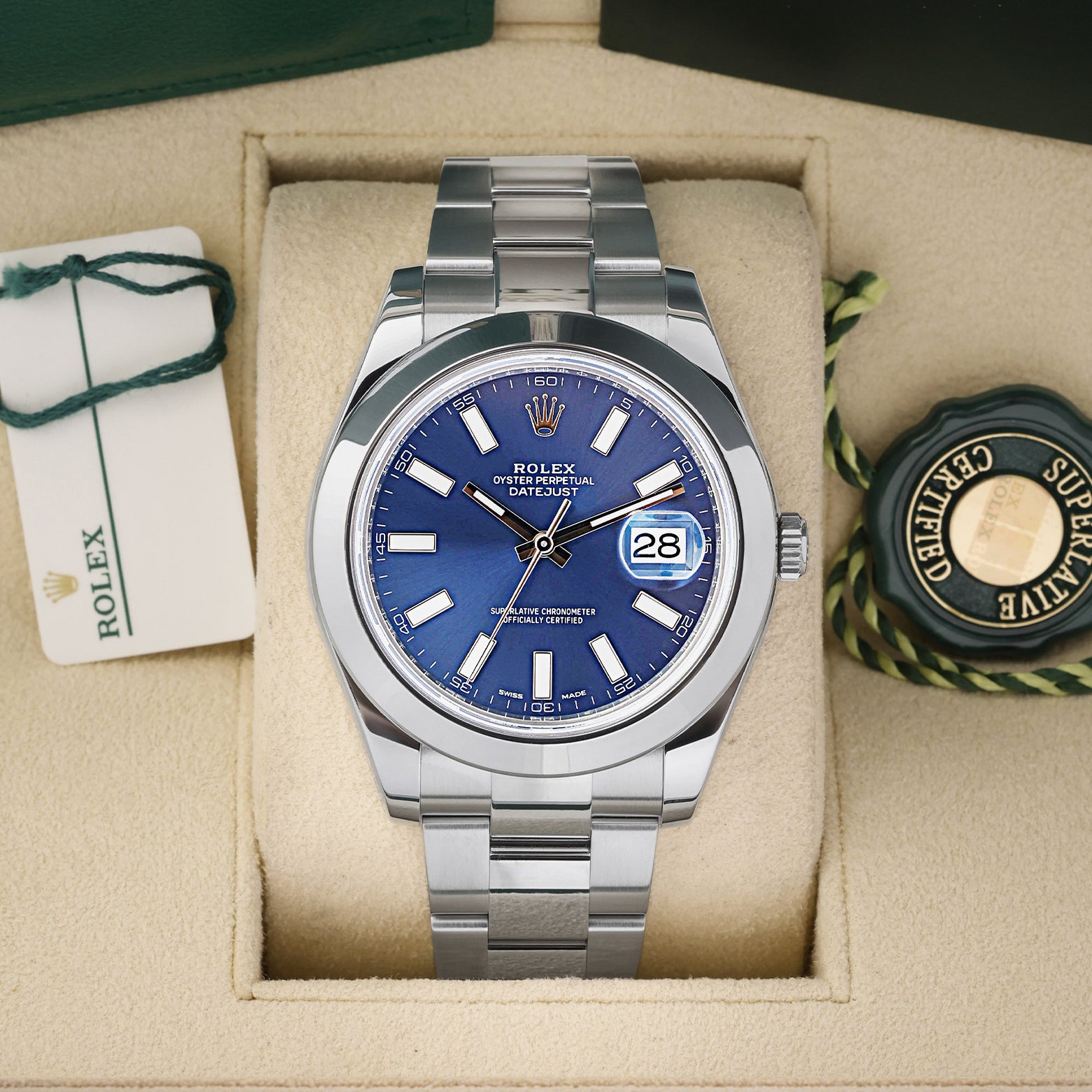 Preowned 2016 Rolex Datejust II 116300 41mm stainless steel watch with smooth bezel and sunray blue index dial at Noah's Fine Watches and Jewelry Dallas Texas