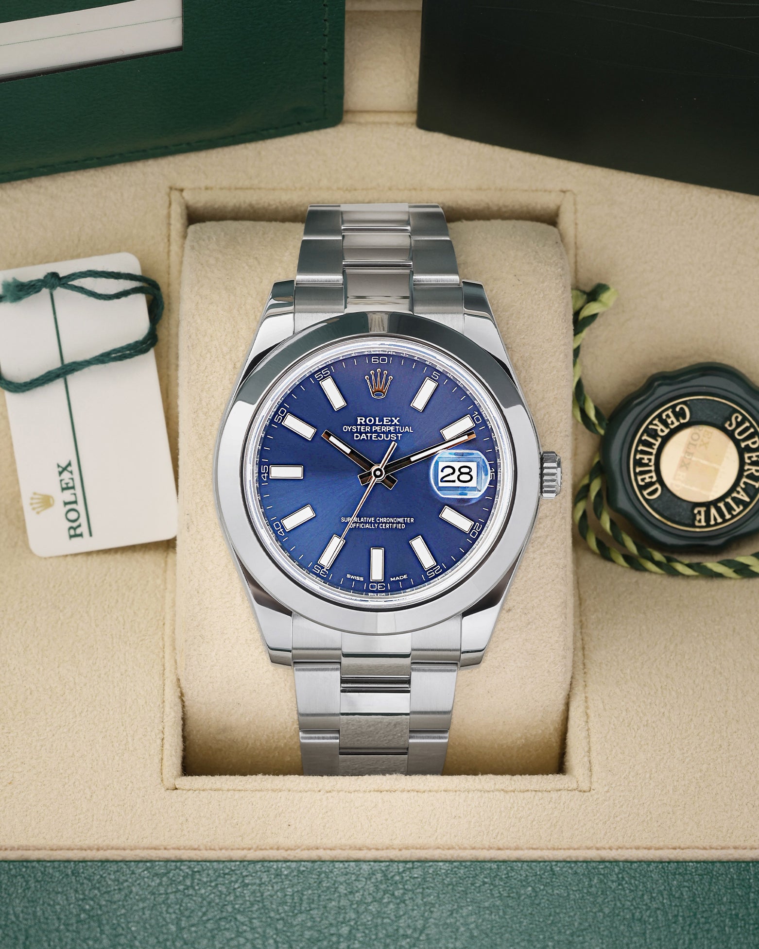 Preowned 2016 Rolex Datejust II 116300 41mm stainless steel watch with smooth bezel and sunray blue index dial at Noah's Fine Watches and Jewelry Dallas Texas