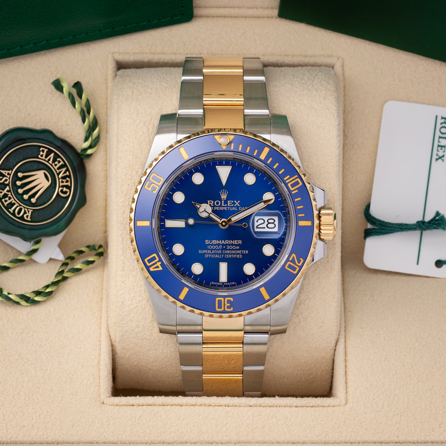 Pre-owned 2018 Rolex Submariner Date 40mm reference 116613LB two-tone yellow gold and stainless steel watch with royal blue dial at Noahs Fine Watches and Jewelry in Dallas TX