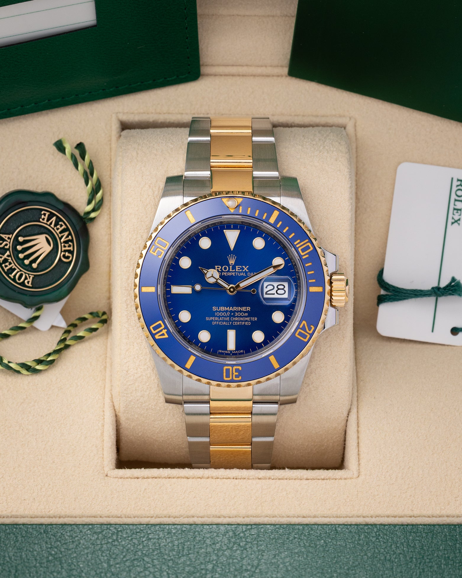 Pre-owned 2018 Rolex Submariner Date 40mm reference 116613LB two-tone yellow gold and stainless steel watch with royal blue dial at Noahs Fine Watches and Jewelry in Dallas TX