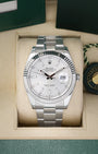 Preowned 2019 Rolex Datejust 41 126334 luxury watch featuring a sunray silver baton dial and solid 18k white gold fluted bezel at Noah's Fine Watches and Jewelry in Dallas