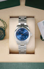 2019 Rolex Oyster Perpetual 31 177200 featuring an Azurro blue dial with Roman numerals, presented inside its official box with hang tags